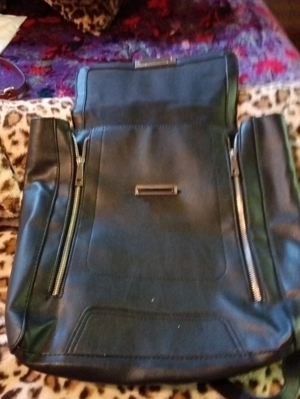 Minimalist Black Faux-Leather Backpack with Front Zip Detail